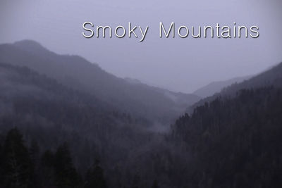 Close-up of green mountains against sky