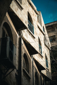 Low angle view of old building against sky