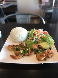 Close-up of food served on table