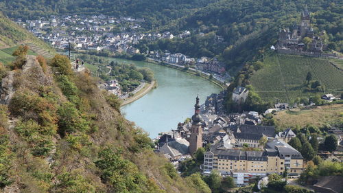 High angle view of river amidst buildings in town