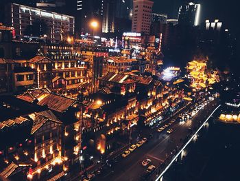 High angle view of illuminated cityscape at night