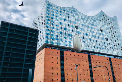Low angle view of modern building against sky