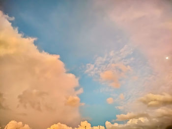 Low angle view of cloudy sky during sunset