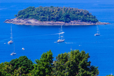 High angle view of sailboat sailing on sea against sky