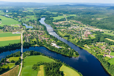 Aerial view of fields and river, djurås, dalarna, sweden