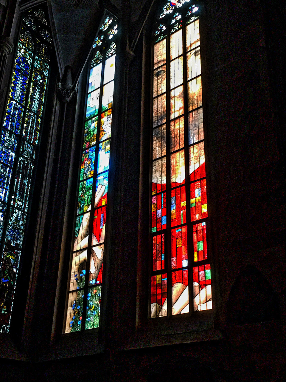 window, stained glass, religion, church, spirituality, place of worship, low angle view, indoors, glass - material, architecture, multi colored, built structure, day, surface level, interior, art product, colorful, backlit, streaming, architecture and art