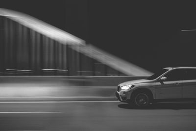 Blurred motion of car on road