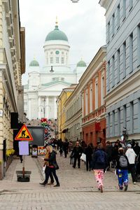 Tourists in front of building