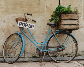 Vintage bicycle  parked against wall