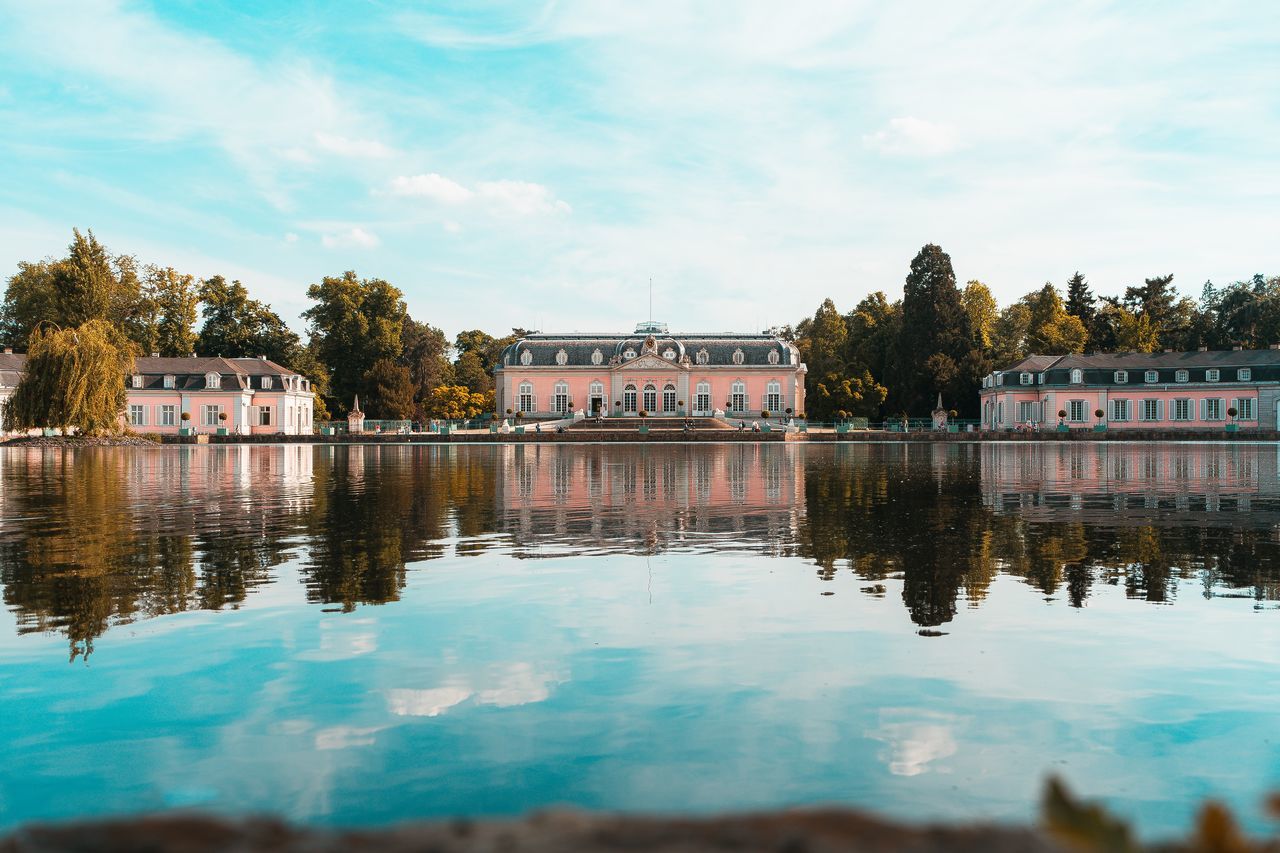 REFLECTION OF TREES IN LAKE