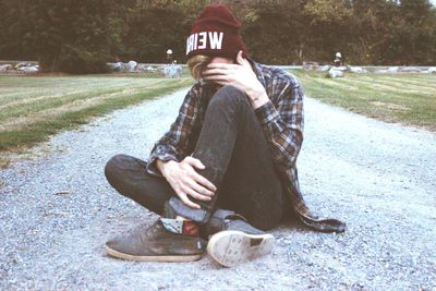 Close-up of woman standing in pond