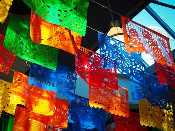 Low angle view of illuminated lanterns hanging