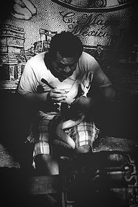 Man sitting on chair at home