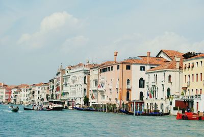 View of buildings in city against sky