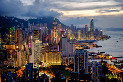 High angle view of city lit up at night