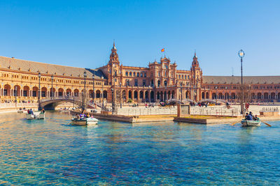 View of buildings against blue sky