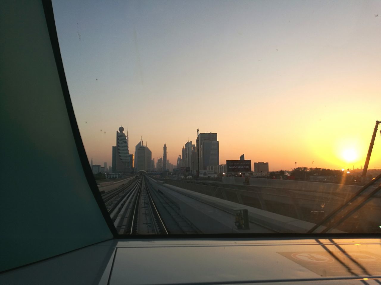 VIEW OF CITY AT SUNSET