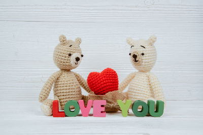 Close-up of stuffed toy over white background