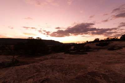 Scenic view of landscape against sky during sunset