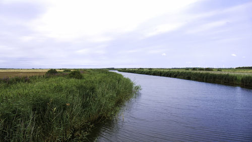 Scenic view of land against sky