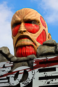 Low angle view of statue against sky