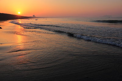 Scenic view of sea against sky during sunset