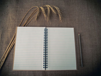 High angle view of open book on table
