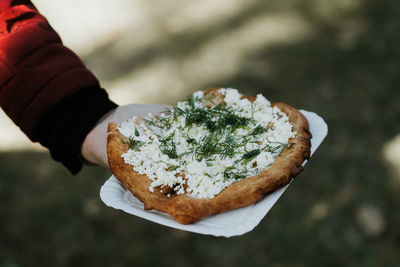 Close-up of hand holding food