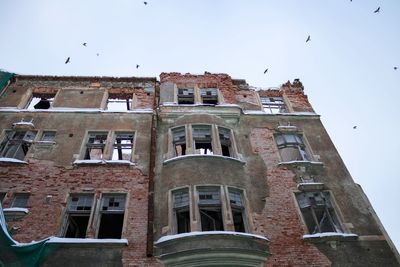 Low angle view of residential building against sky