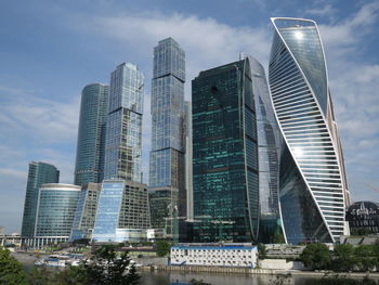 Low angle view of modern buildings against sky