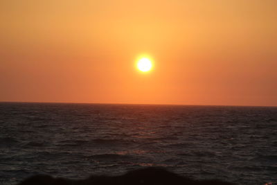 Scenic view of sunset over sea