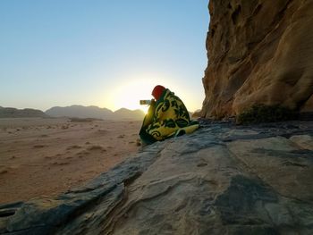 Rock formations on land against sky