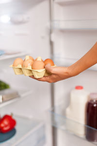 Midsection of man preparing food in kitchen