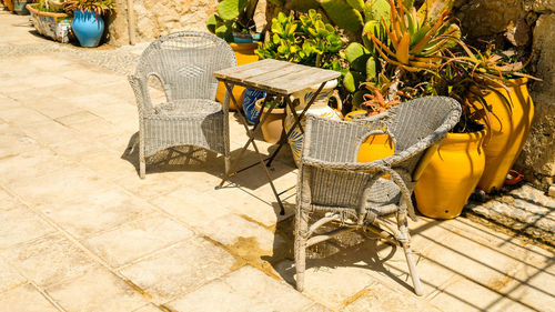 High angle view of empty chair on table