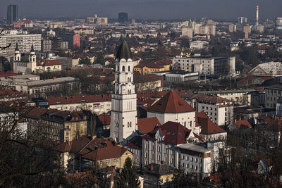 High angle view of illuminated buildings in city