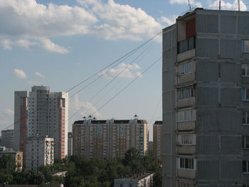 Modern buildings against sky in city