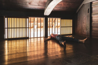 Man lying down on floor