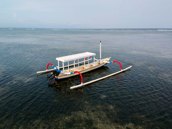 High angle view of ship in sea against sky