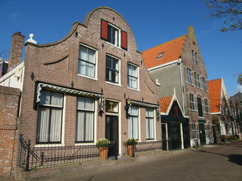 Low angle view of buildings against sky