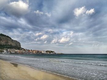 Scenic view of beach against sky