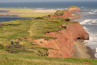 Scenic view of cliff against sea