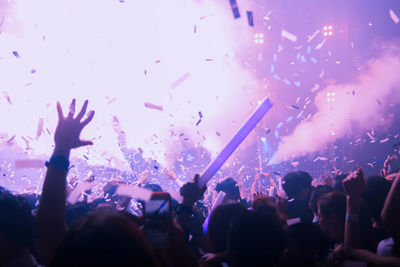 Crowd enjoying at music concert