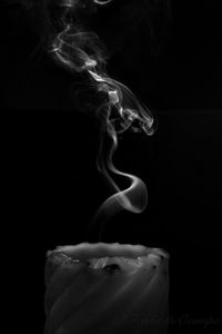 Close-up of bread against black background