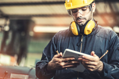 Man working with mobile phone