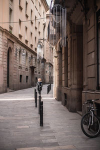 Woman standing on city street