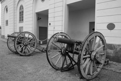 Canons on street outside building