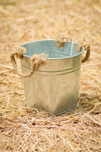 Close-up of hay bales on field