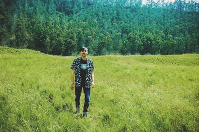 Full length of man standing on field