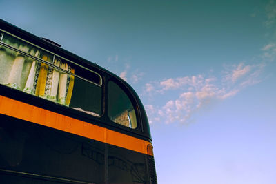 Low angle view of train against sky