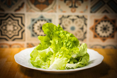 Close-up of fruits in plate on table